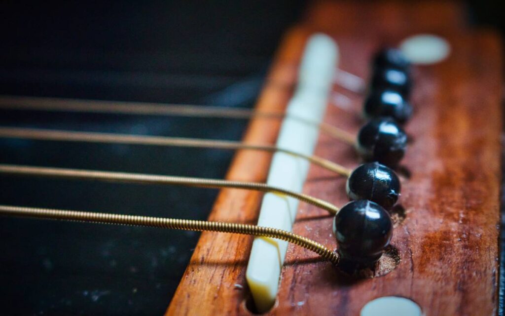 A closeup shot of guitar strings