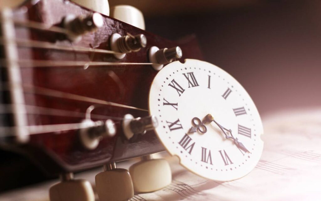 Guitar neck and roman numeral clock