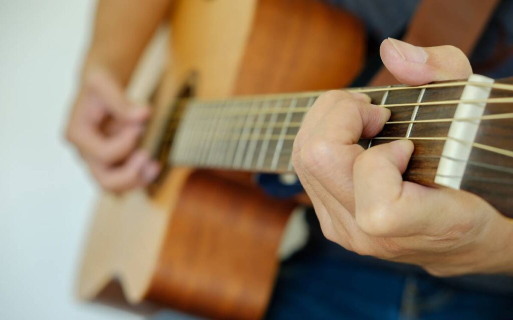 Man playing acoustic guitar