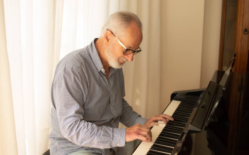 Old man playing piano