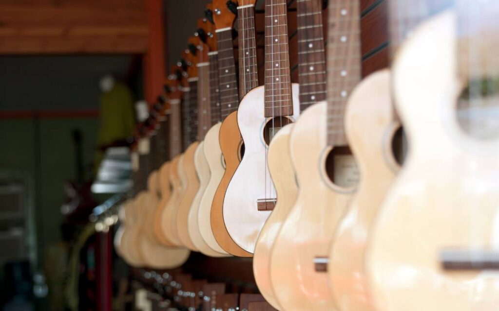Ukuleles hanging in a store