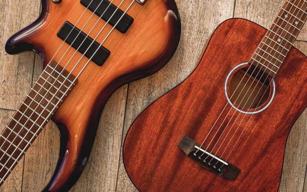 Acoustic and electric guitar lying on the floor