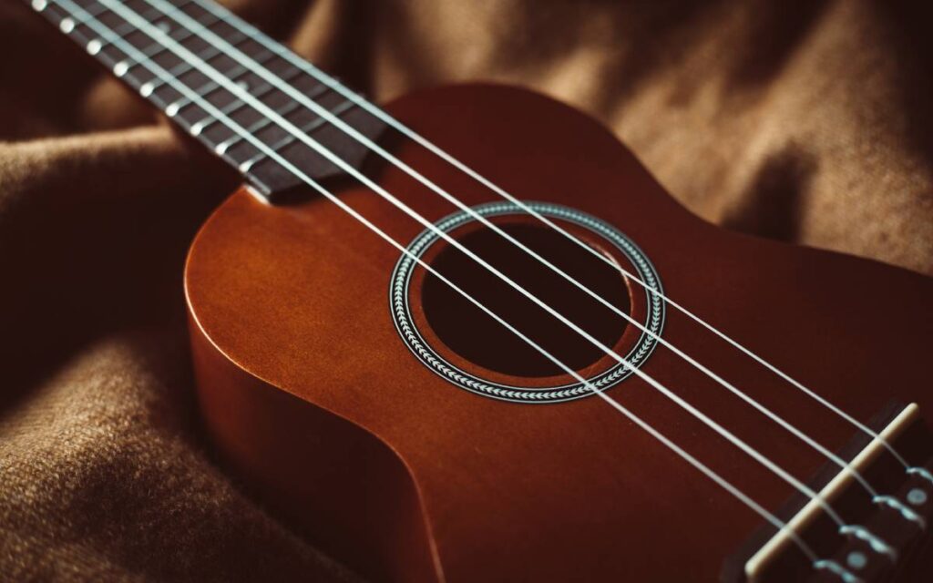 Close up of a brown ukulele