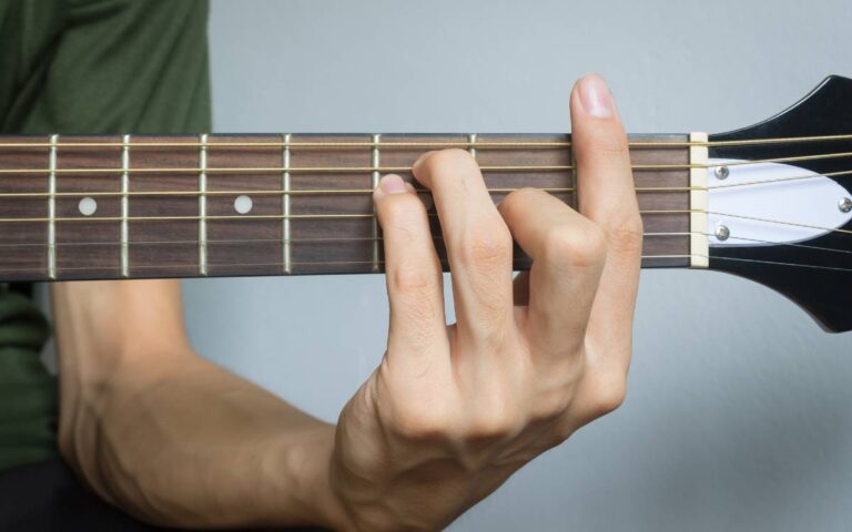 How to Play F Chord on Guitar the Easy Way (plus variations)