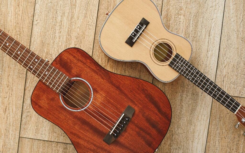 Ukulele and acoustic guitar on the floor