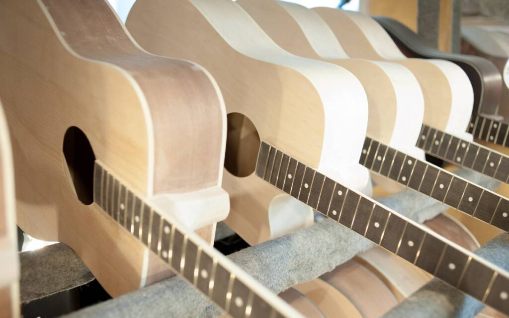 Unfinished acoustic guitars at workshop