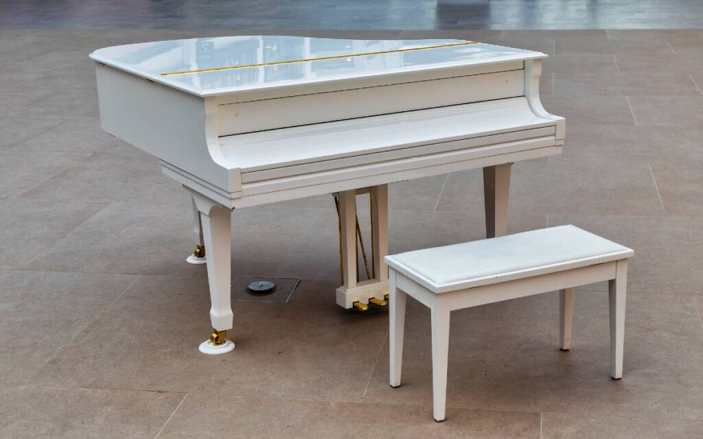 White baby grand piano