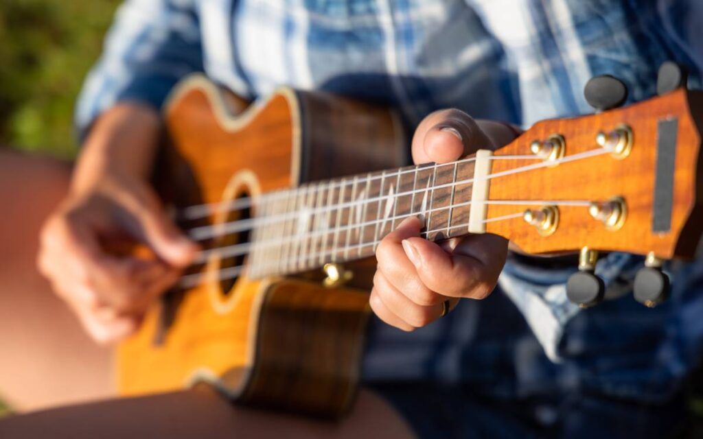 Woman playing ukulele