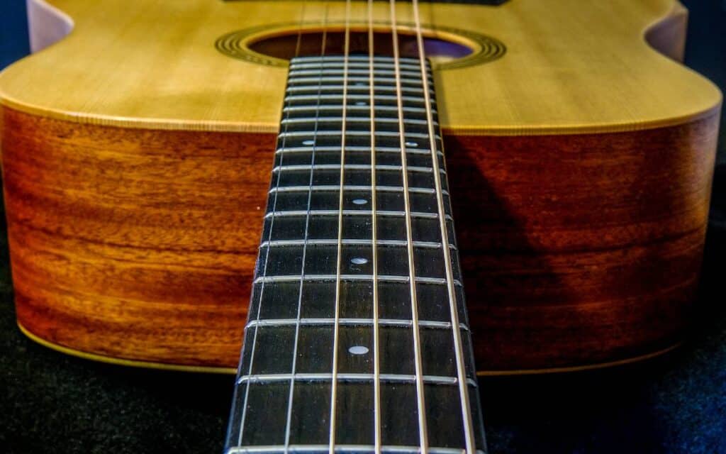 Close up of acoustic guitar neck