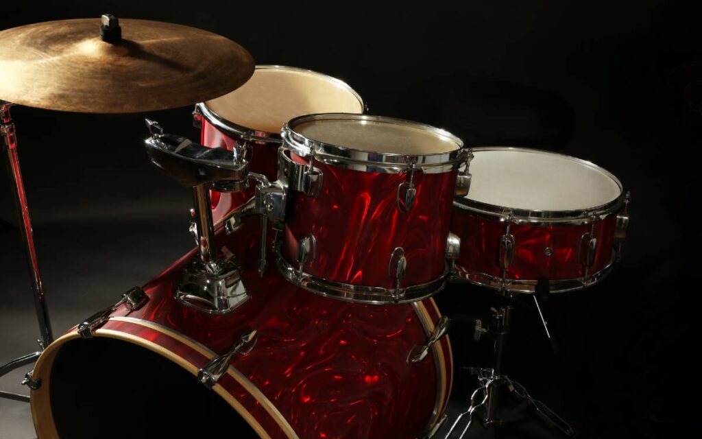 Drum set on black background