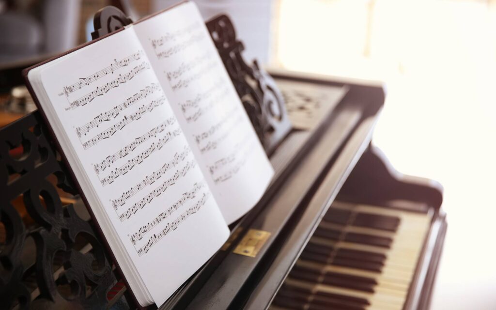 Music sheet on piano
