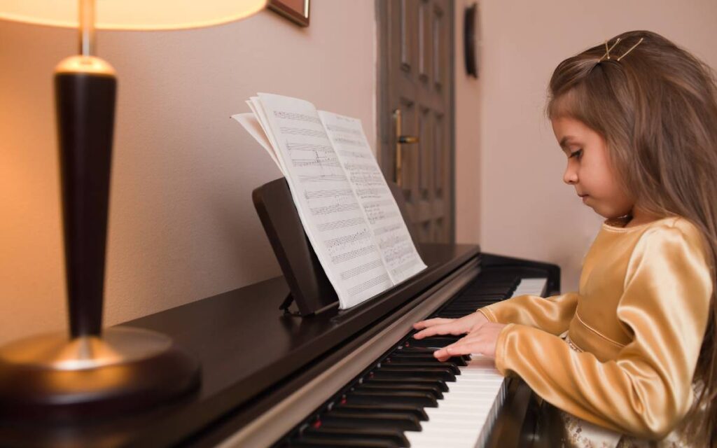 Little girl playing piano