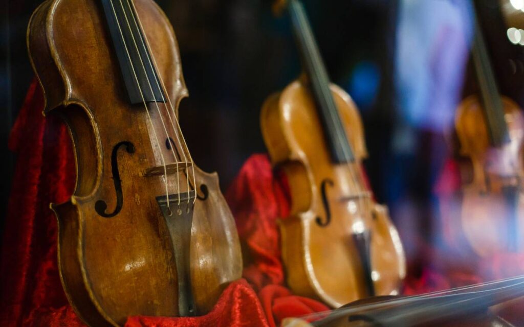 Violins on red cloth