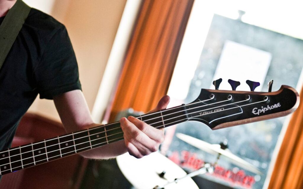 Guitarist playing an epiphone guitar