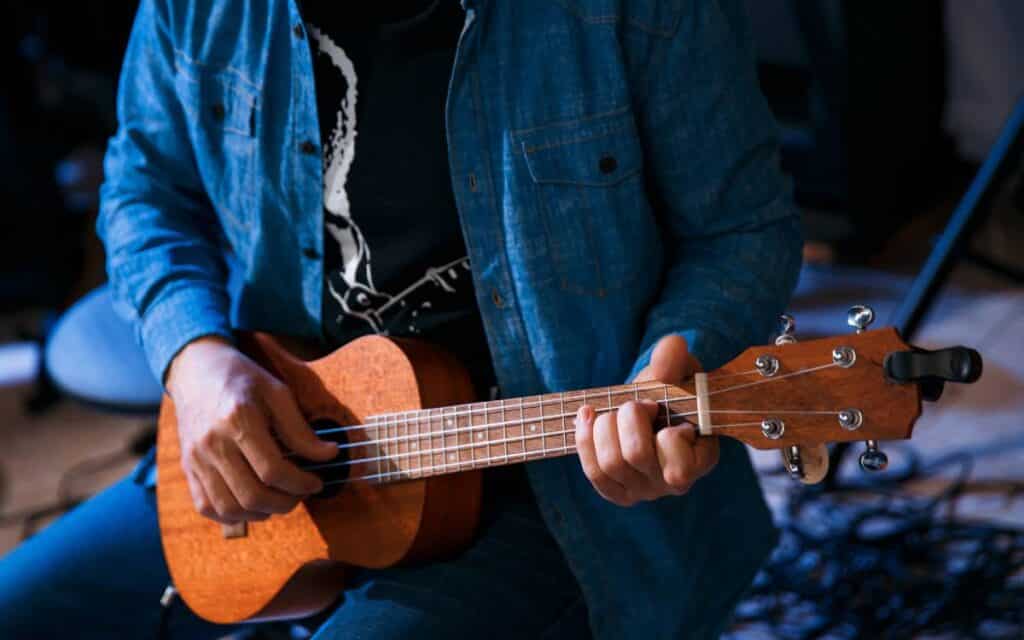 Man playing ukulele