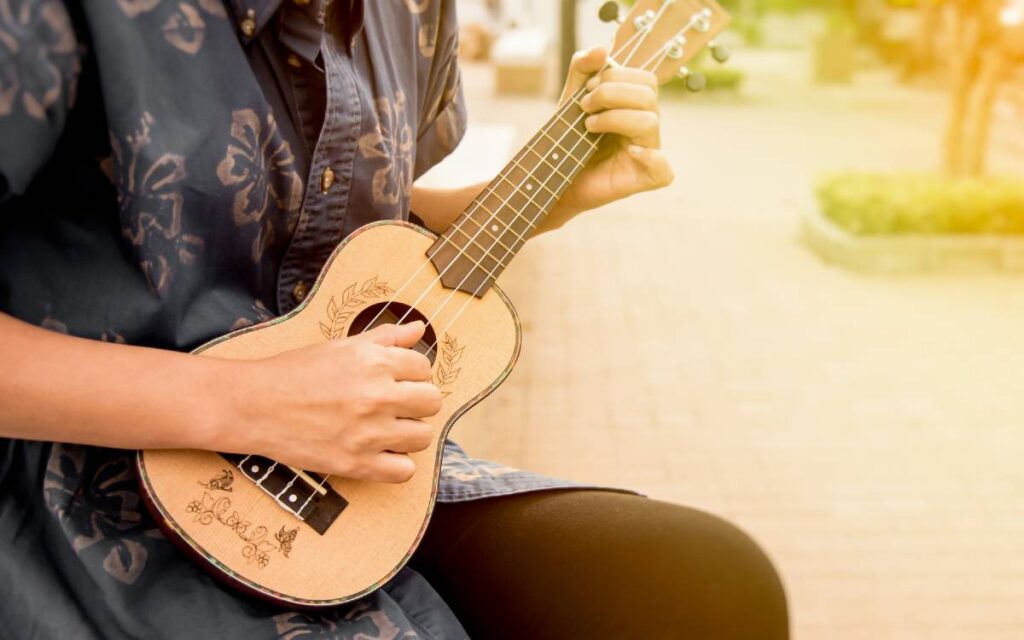 Woman playing ukulele