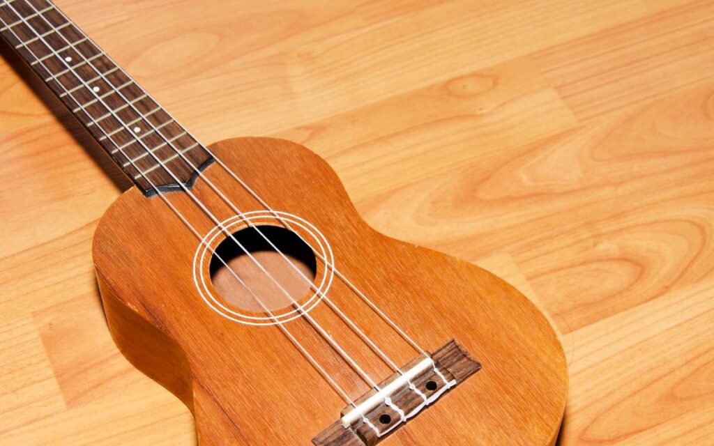 Ukulele on wooden floor