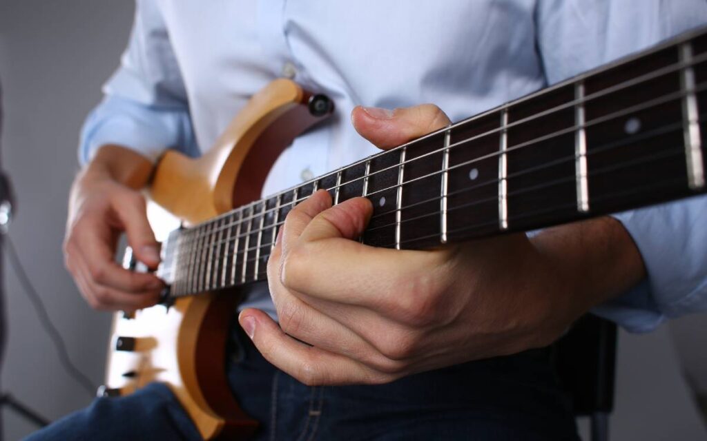 Man playing electric guitar