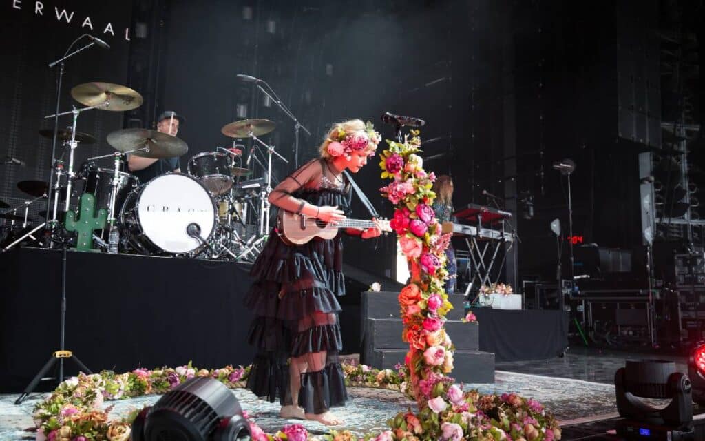 Grace vanderwaal performing live on stage with her ukulele