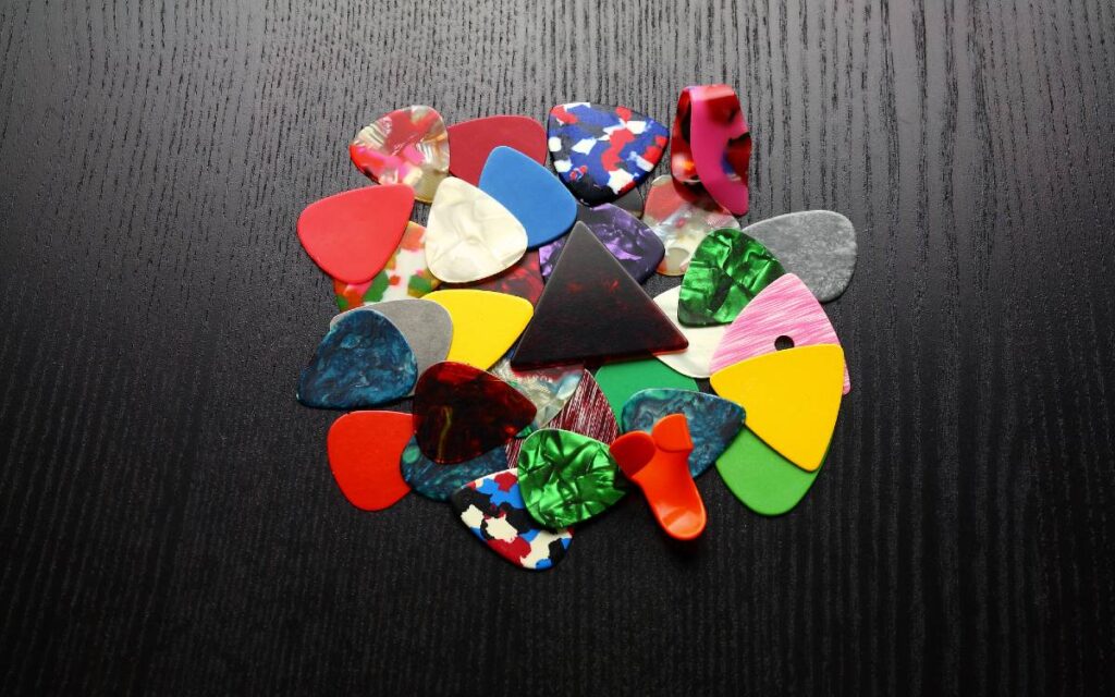 Guitar picks in different types, colors and sizes