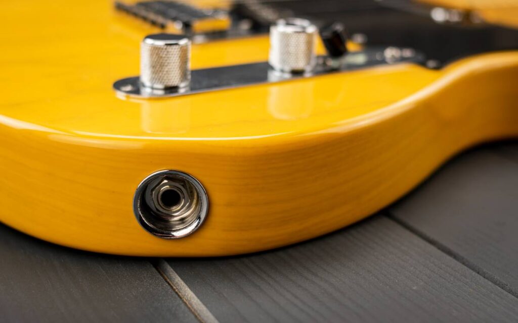 Close-up of an electric guitar input jack