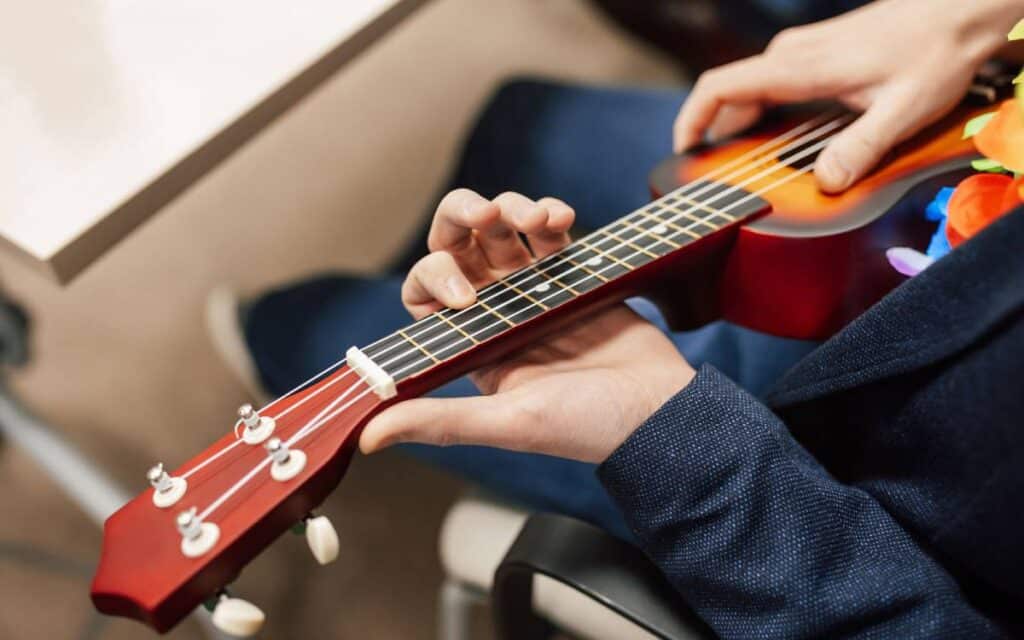 Man playing ukulele